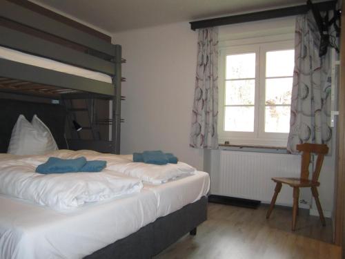 Ein Bett oder Betten in einem Zimmer der Unterkunft Gasthof Fair