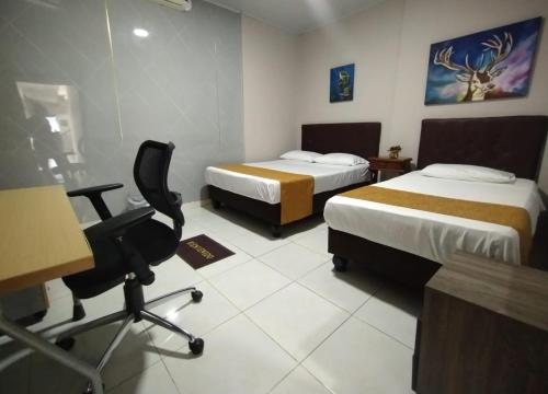 Hotel Parque del Perroにあるベッド