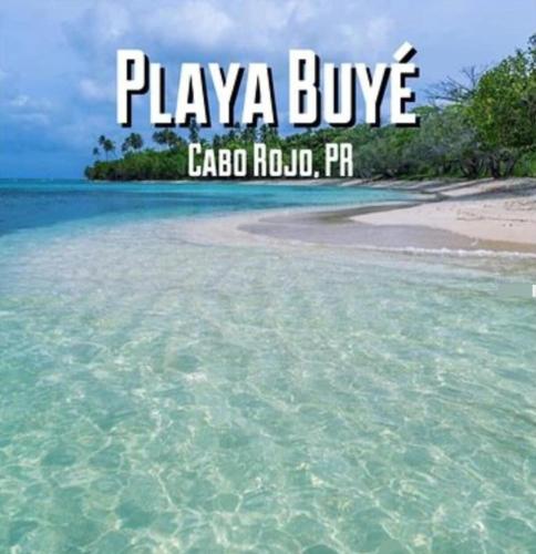a beach with the words playa buvicecada hudaho pr at Close to Combate beach, el poblado and restaurants in Pole Ojea