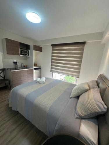 Llit o llits en una habitació de Edificio Samay 521