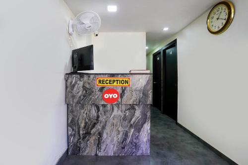 Certifikát, hodnocení, plakát nebo jiný dokument vystavený v ubytování Hotel O Ashwi
