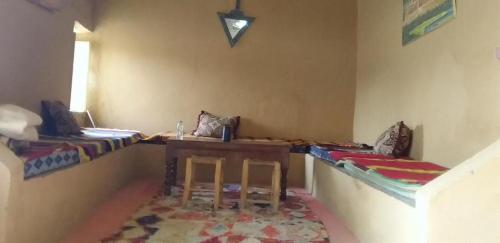 Postel nebo postele na pokoji v ubytování Sahara Desert Activites