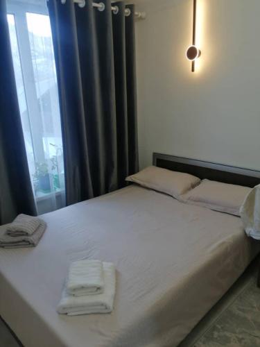 Postel nebo postele na pokoji v ubytování Modern Homestay