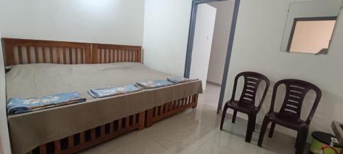 Uma cama ou camas num quarto em LetsGokarna vacation stay