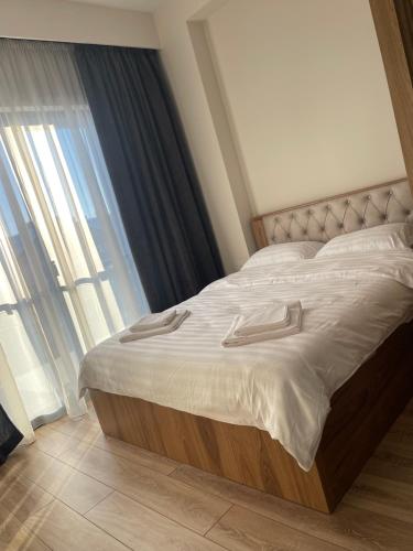 Postel nebo postele na pokoji v ubytování New Gudauri Apartment Redco F3