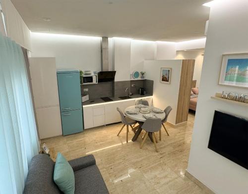 Kuchyň nebo kuchyňský kout v ubytování Apartamento céntrico cerca de Torres de Serrano y Viveros