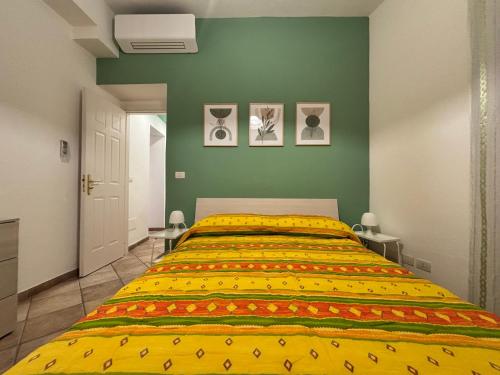 Giường trong phòng chung tại Casa Giorgio