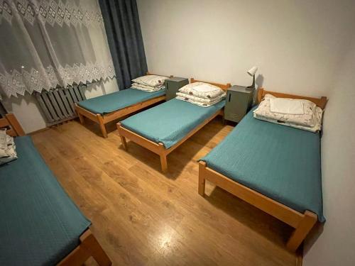 Postel nebo postele na pokoji v ubytování Dom Gościnny Filip