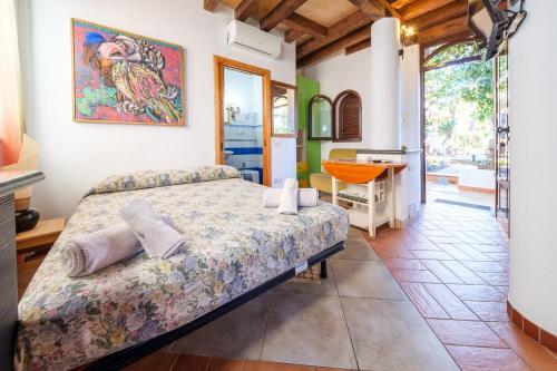 Postel nebo postele na pokoji v ubytování B&B Il Giardino Segreto