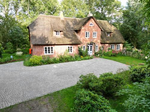 Zahrada ubytování Reetdachhaus Warft Simmerdeis - Maisonettewohnung