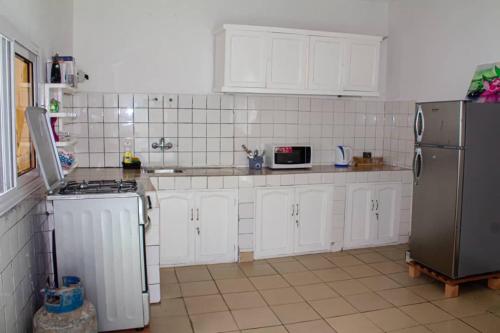 Køkken eller tekøkken på Maison indépendante proche du Centre-ville