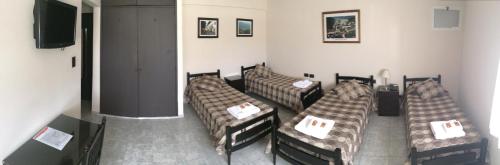 Ένα ή περισσότερα κρεβάτια σε δωμάτιο στο Hotel Euzko Alkartasuna