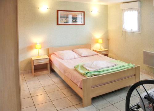 Postel nebo postele na pokoji v ubytování Appartement spacieux vue mer Trévou