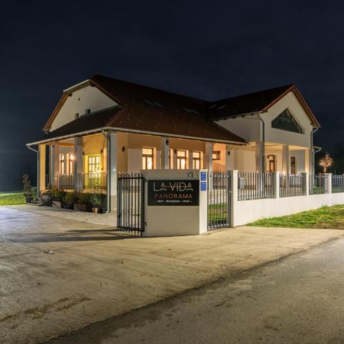 a house with a gate in front of it at La Vida Panorama in Batina