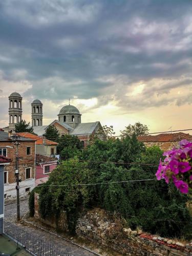 a view of a city with domes in the background at Domus Hotel in Korçë