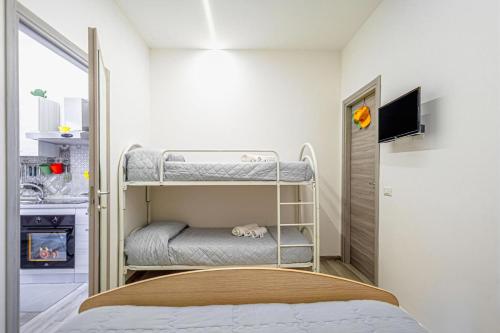 Postel nebo postele na pokoji v ubytování Al Baglio 2