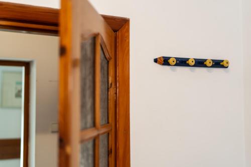a door handle on a door with a window at Hotel Europa in Polanica-Zdrój