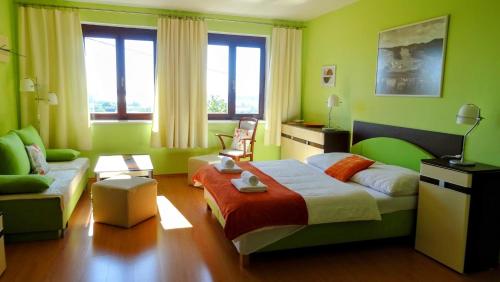 Cama ou camas em um quarto em Apartmán Nesyt