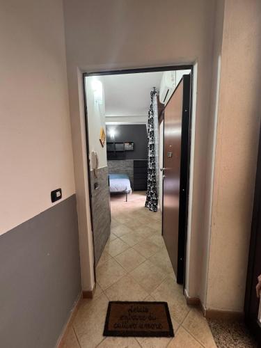 a hallway with a door leading to a room at Home 07 - Centro Argenta in Argenta