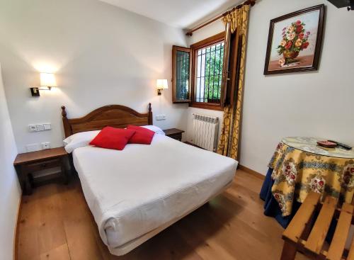 Ένα ή περισσότερα κρεβάτια σε δωμάτιο στο Apartamentos Javier