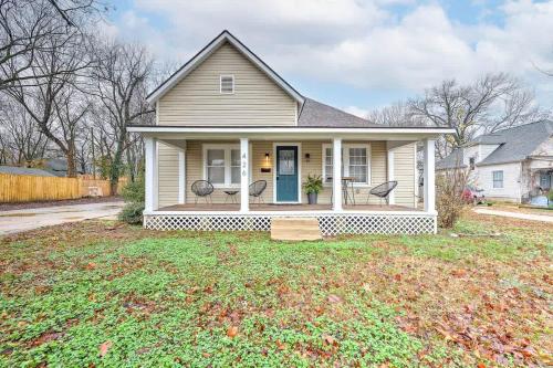 a house with two chairs on the front porch at Decca's Uptown Oasis in Siloam Springs