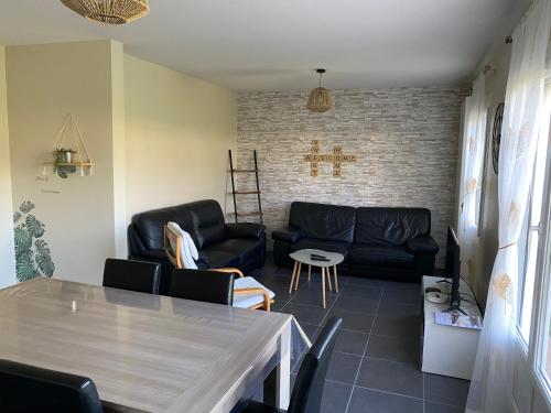 Posezení v ubytování Gite de l'Albizia