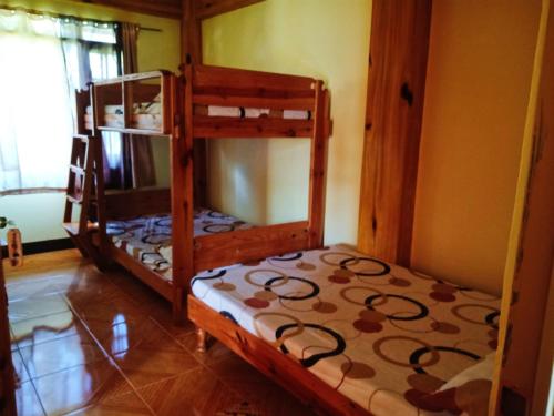 Gambar di galeri bagi Rustic Unit at SAGADA DOWNTOWN RESTHOUSE di Sagada