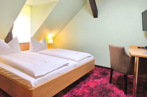 Postel nebo postele na pokoji v ubytování Hotel Burgas
