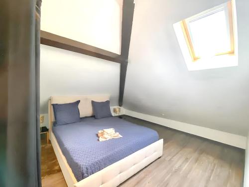 Cama o camas de una habitación en Appartement charmant avec vue sur mer à La Trinité, 65 m²