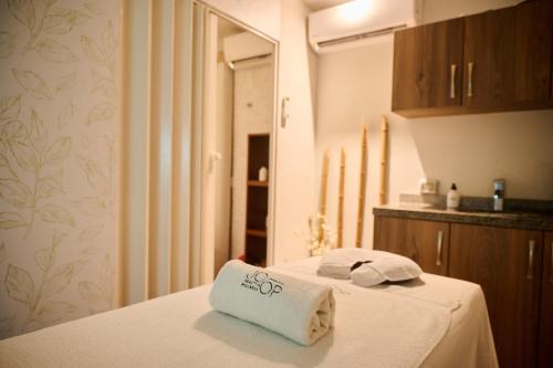 a room with a bed with two towels on it at Casa Andina Select Miraflores in Lima