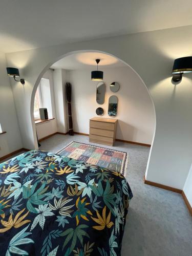 Postel nebo postele na pokoji v ubytování Joli appartement situé à saales