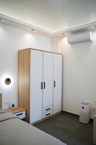 Ένα ή περισσότερα κρεβάτια σε δωμάτιο στο Atelier