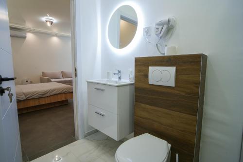 Ένα ή περισσότερα κρεβάτια σε δωμάτιο στο Atelier