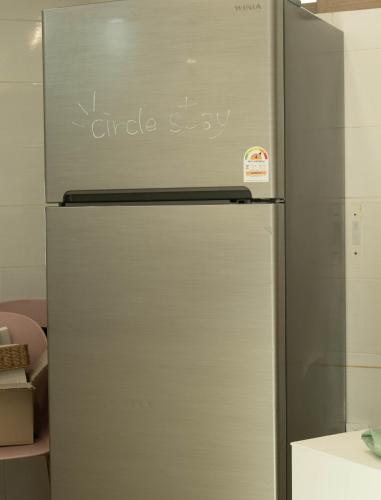 a refrigerator with the words child sex written on it at Busan Circle Stay Hotel in Busan