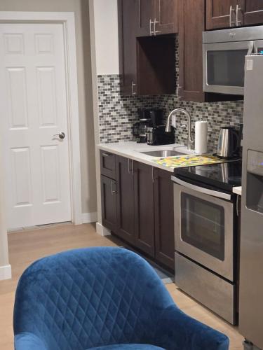 Η κουζίνα ή μικρή κουζίνα στο 2 Bedroom Secondary Suite