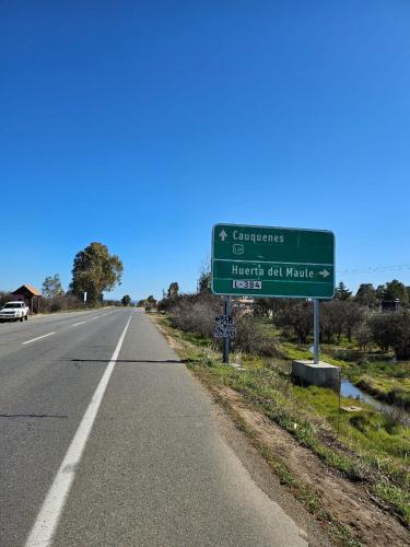 a street sign on the side of a road at Cabañas Hostalner in Carrizales