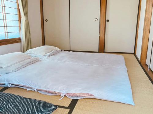 BLO富津市大堀-Private Villa in Futtsuにあるベッド