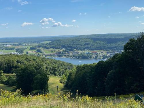 a view of a lake from a hill at Slippery Slope Cabin at Deep Creek Lake / Wisp Mountain (3 BR) in McHenry