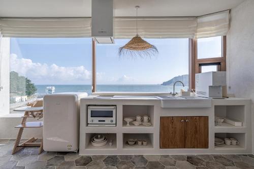 Una cocina o cocineta en HoHo House Songjeong
