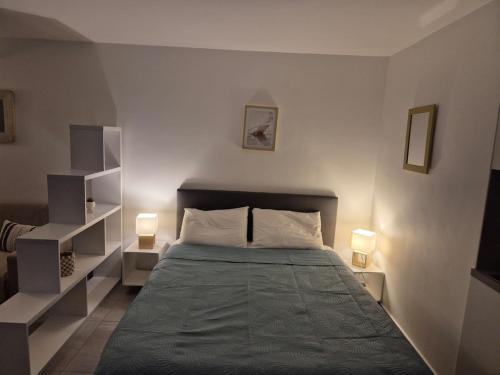Ένα ή περισσότερα κρεβάτια σε δωμάτιο στο Beachfront apartment