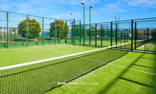 a tennis net on a tennis court at Moorea Boutique Resort Samui in Ban Tai