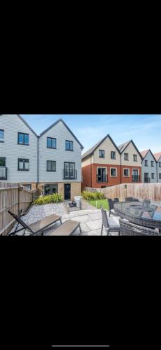 a group of buildings with a skate park in front at 3 Bedroom Beautiful Home with Garden, AC, Hot Tub in Portsmouth