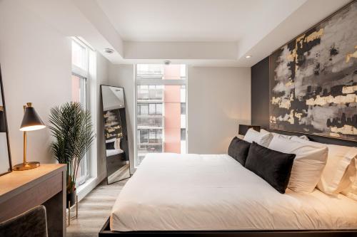 Ένα ή περισσότερα κρεβάτια σε δωμάτιο στο Westview Luxury Suites
