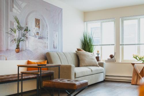 a living room with a couch and a table at Chez Alphonse in Seattle