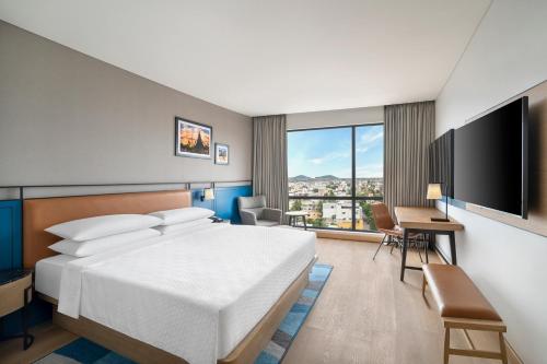 Postel nebo postele na pokoji v ubytování Four Points by Sheraton Chennai, Velachery