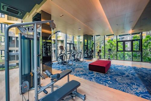 a gym with cardio equipment in a building at The Base Central Phuket-C54BS in Phuket Town