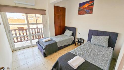 Ένα ή περισσότερα κρεβάτια σε δωμάτιο στο Unique City Center Rooms, 150m from Chabad Lubavitch