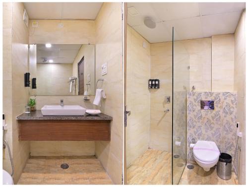 a bathroom with a shower and a sink and a toilet at Hotel Royale Hills By RSP Vista Hotels & Resorts in Rishīkesh