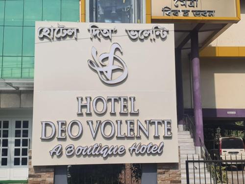 a sign for a hotel de valleille acupuncture hotel at HOTEL DEO VOLENTE in Sivasagar