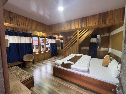 Postel nebo postele na pokoji v ubytování Odyssey's Darap Eco Retreat